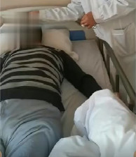 脑梗死第二天即可被扶着下地站